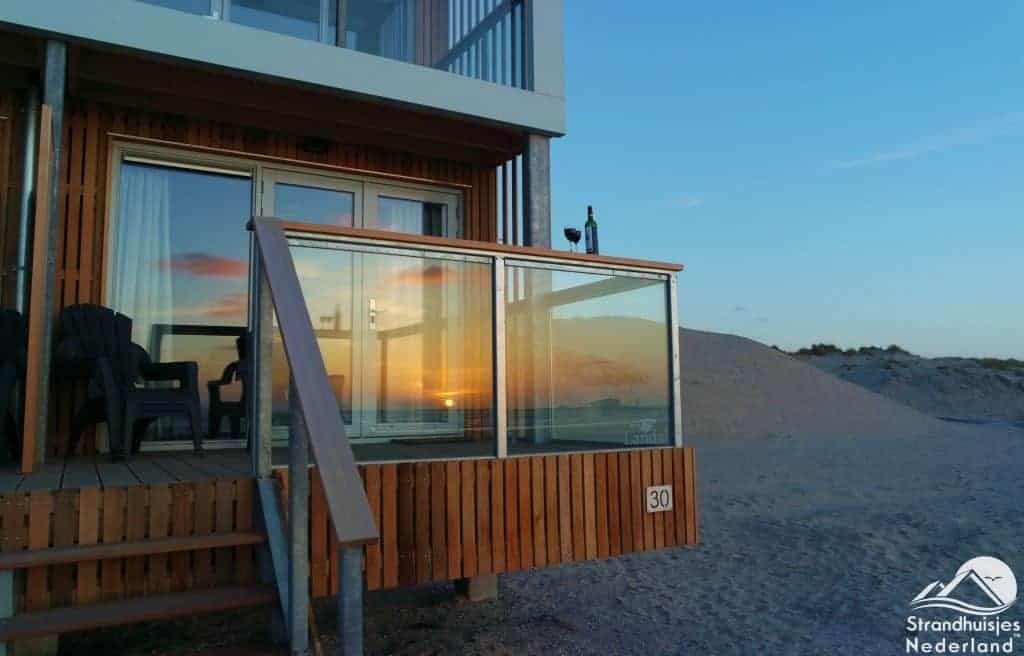 Zonsondergang strandhuis Hoek van Holland